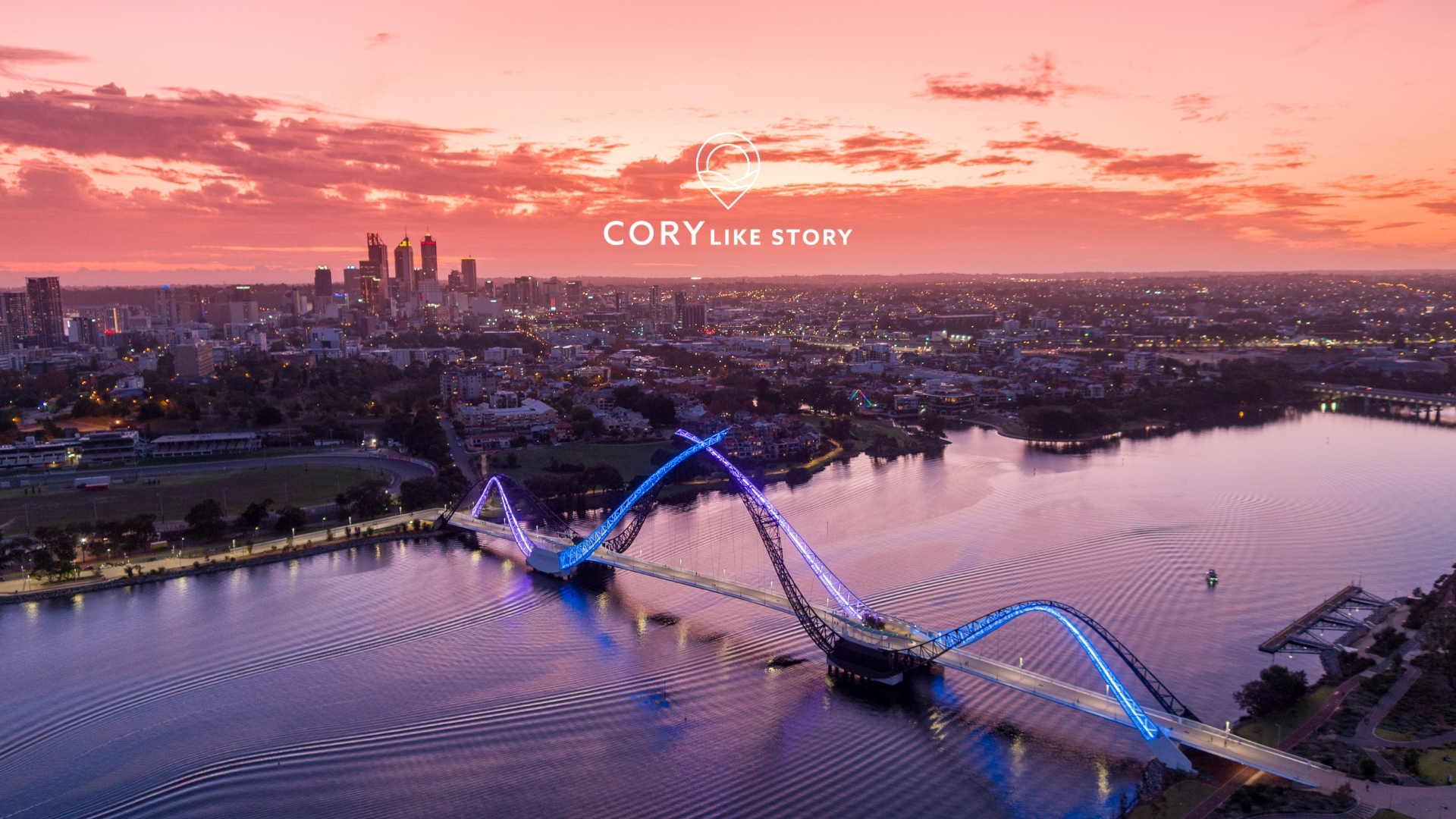 Sunset image over Perth city skyline, Swan River and Matagarup Bridge.